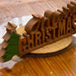 Wooden carved Merry Christmas decoration 38 cm long with Tree and Star